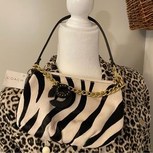 Coach hand bag white and black with tag.